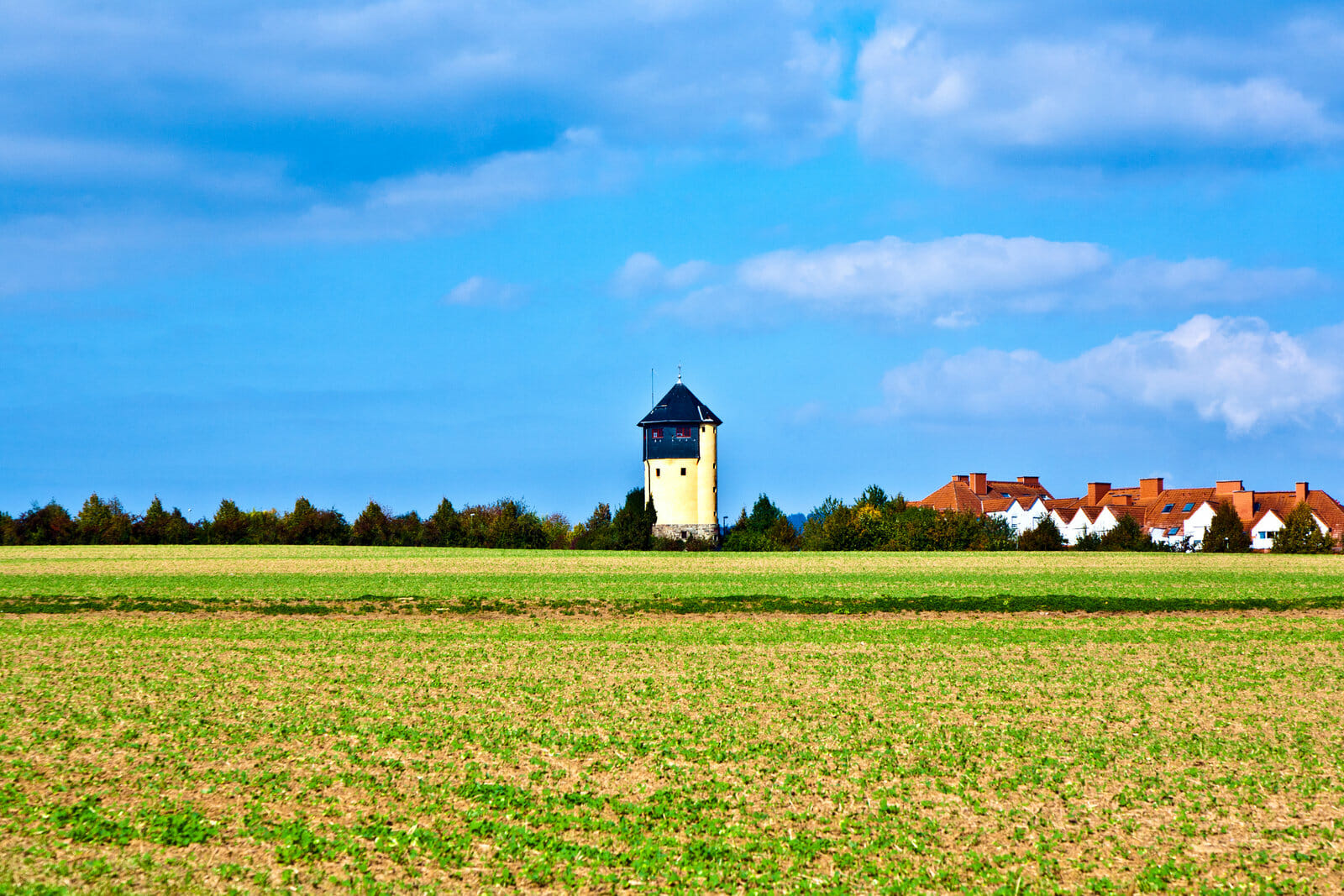 7546838 settlement beside an old watertower