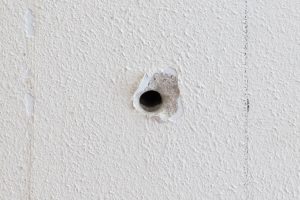 How to Repair Holes in Walls in Your Rental Property